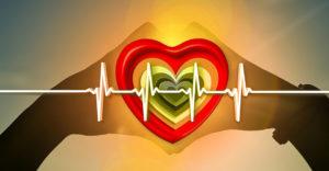 Elektrokardiogram över hjärta och händer.