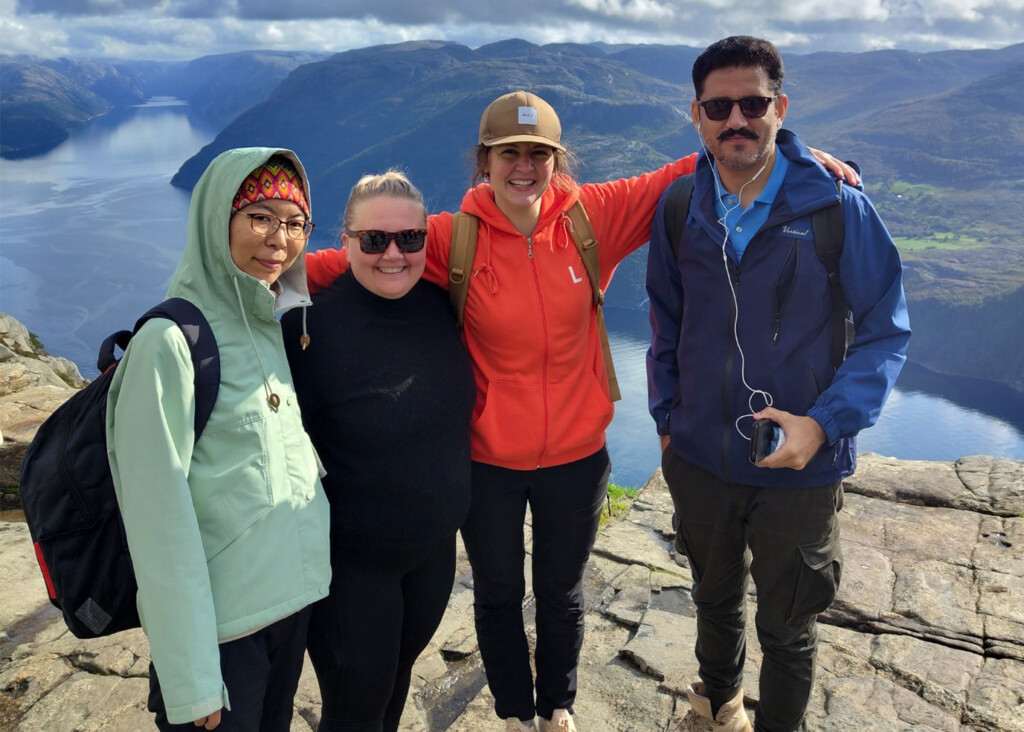 Four people on the mountain.